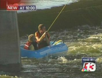 Wanek and Treptow in raft trapped at Scott Street dam
