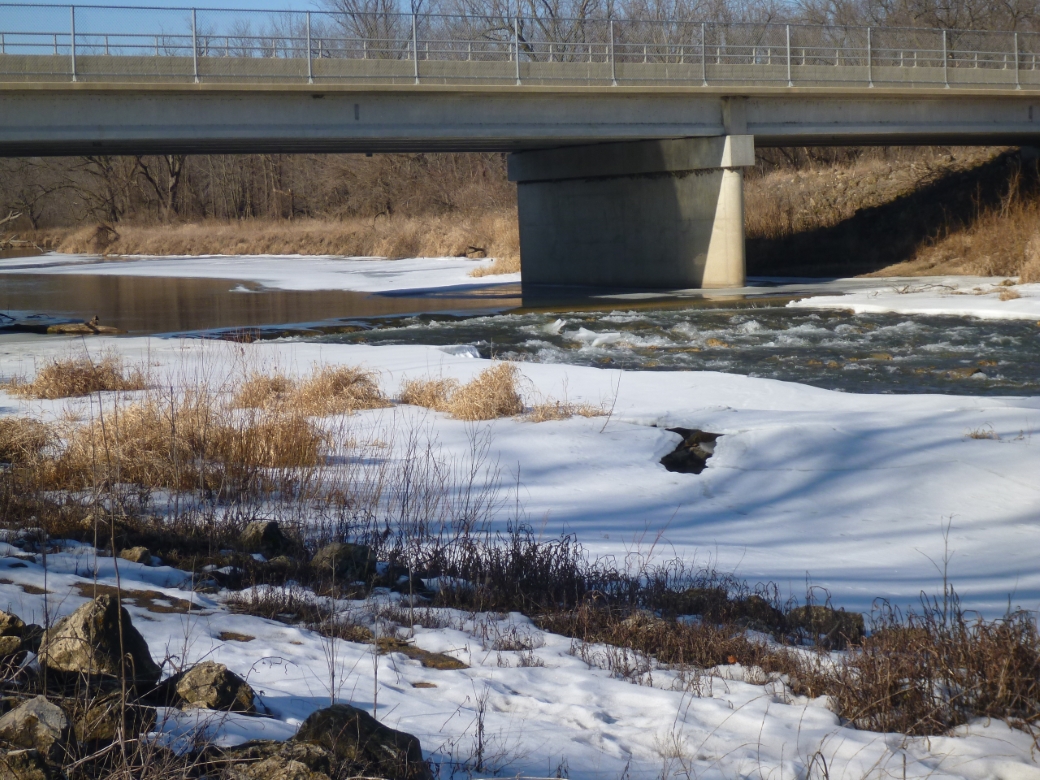 View of dam mitigated to rock riffle