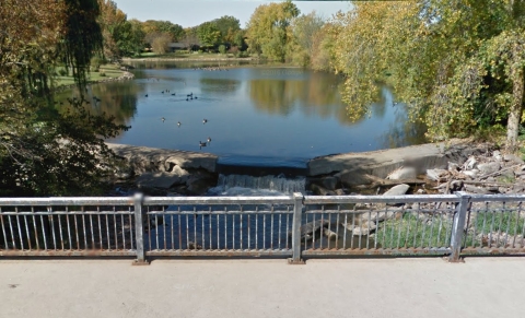 Looking west over dam and pond from N Pierce Avenue bridge